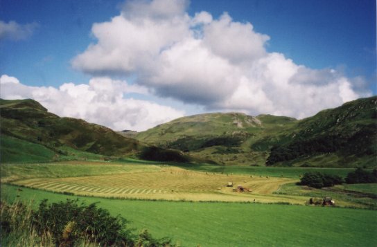 August 01, A view looking up the glen with the Arable Silage baling in the foreground
